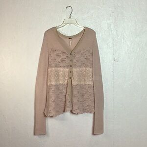 Light pink knit Free People cardigan with crochet and lace detail